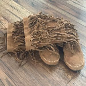 Tan moccasin fringe boots